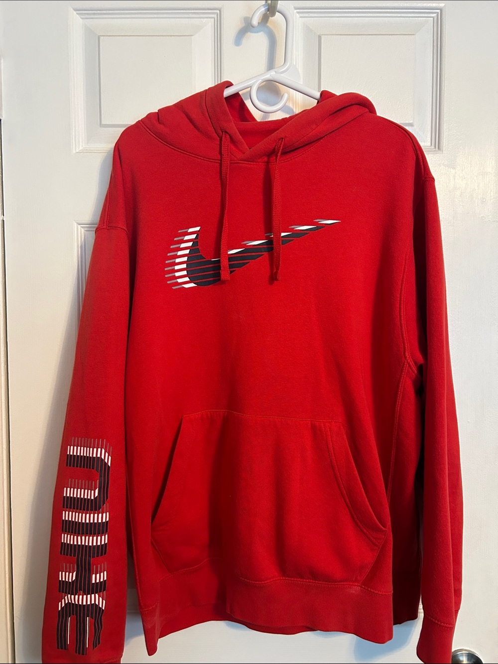Nike Red Hoodie with Striped Swoosh and Sleeve Graphic